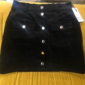 Unique Vintage Marlo Corduroy black mini skirt. 100% cotton.
